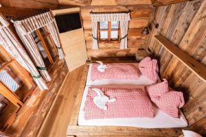 Postel nebo postele na pokoji v ubytování Kulinarik zur Stoa Alm
