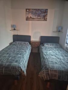 Postel nebo postele na pokoji v ubytování La Dolce Corte Suite