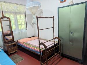 Postel nebo postele na pokoji v ubytování Vindy Homestay