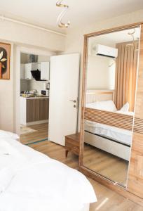 Postel nebo postele na pokoji v ubytování Two Bedroom King Suite TH30