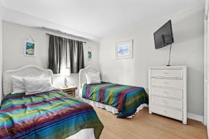 Postel nebo postele na pokoji v ubytování Myrtle Beach Resort B436 + 39 fotografií