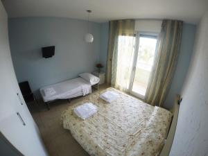 מיטה או מיטות בחדר ב-B&B Via Gallipoli
