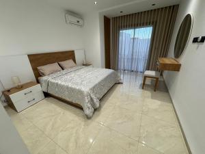Postel nebo postele na pokoji v ubytování Julia Appartment Sea View