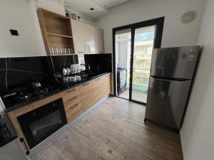 Kuchyň nebo kuchyňský kout v ubytování Julia Appartment Sea View