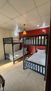 Ένα ή περισσότερα κρεβάτια σε δωμάτιο στο Goodtime Utopia Guesthouse