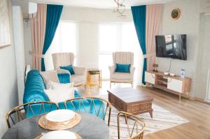 A television and/or entertainment centre at King Suite AN33