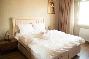 A bed or beds in a room at King Suite AN33