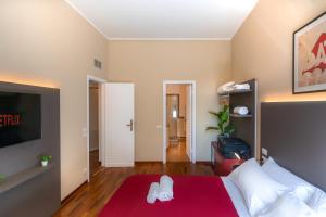 Postel nebo postele na pokoji v ubytování Residenza Girardi