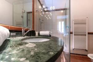 Koupelna v ubytování Residenza Girardi