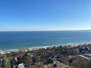 an aerial view of the ocean with houses and condos at Apartment Ostseeblick 131 in Timmendorfer Strand