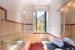 Koupelna v ubytování Residenza Girardi + 37 fotografií