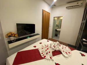Voodi või voodid majutusasutuse Eclipse Legend Hotel toas