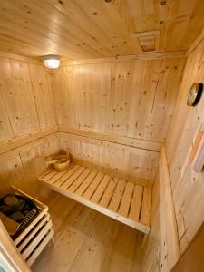 an inside view of a wooden sauna at Ploy Mountain View Pool Villa in Ban Thai Thai