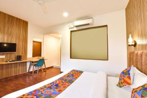 Fabhotel Morjim Bliss - 500M From Morjim Beach客房内的一张或多张床位