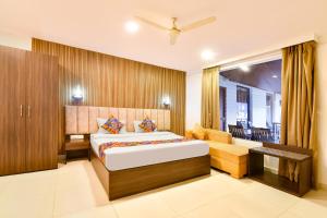 Fabhotel Morjim Bliss - 500M From Morjim Beach客房内的一张或多张床位