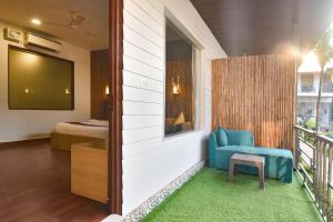 Fabhotel Morjim Bliss - 500M From Morjim Beach的休息区