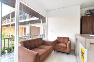 Fabhotel Morjim Bliss - 500M From Morjim Beach的休息区