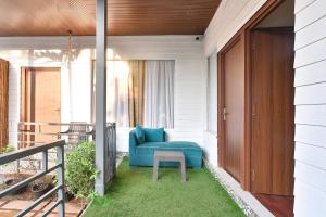 Fabhotel Morjim Bliss - 500M From Morjim Beach的休息区