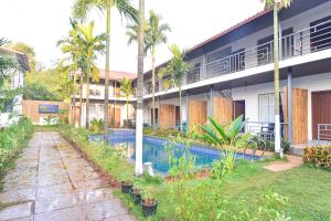 Fabhotel Morjim Bliss - 500M From Morjim Beach内部或周边的泳池