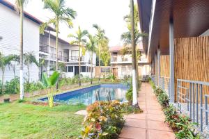 Fabhotel Morjim Bliss - 500M From Morjim Beach内部或周边的泳池