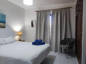 Postel nebo postele na pokoji v ubytování NUEVA NERJA 22 MENYBER
