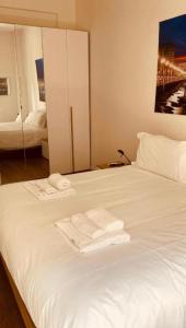Letto o letti in una camera di Pizzoli Suite
