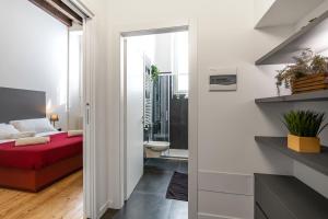 Postel nebo postele na pokoji v ubytování Residenza Girardi