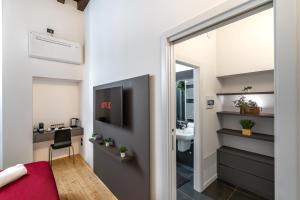 TV a/nebo společenská místnost v ubytování Residenza Girardi