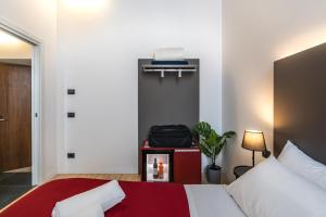 Postel nebo postele na pokoji v ubytování Residenza Girardi