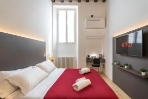 Postel nebo postele na pokoji v ubytování Residenza Girardi