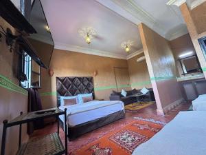 Postel nebo postele na pokoji v ubytování Hotel Zagour - Luxury hotel in Zagora