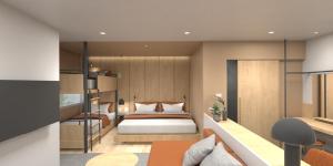 The Publyc Hotel客房内的一张或多张床位