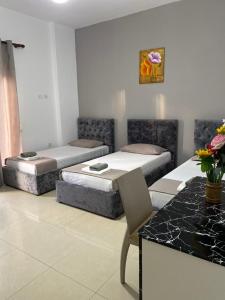 A bed or beds in a room at ZoiHome