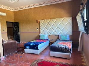 Postel nebo postele na pokoji v ubytování Hotel Zagour - Luxury hotel in Zagora