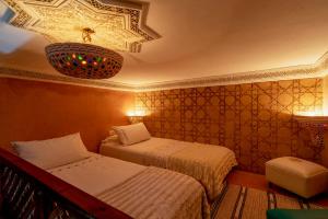 Postel nebo postele na pokoji v ubytování Samira Group & Spa