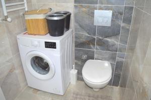 A bathroom at Two Bedroom King Suite BH46
