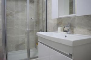 A bathroom at Two Bedroom King Suite BH46