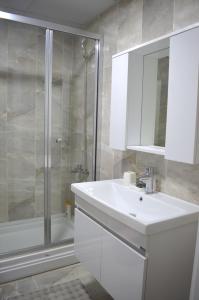 A bathroom at Two Bedroom King Suite BH46