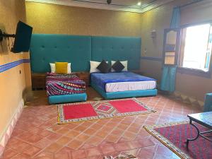 Postel nebo postele na pokoji v ubytování Hotel Zagour - Luxury hotel in Zagora