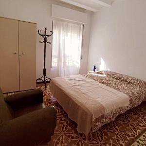 En eller flere senge i et værelse på Casa Centenaria en Cortes de Pallás