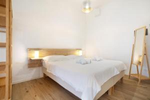 Postel nebo postele na pokoji v ubytování Residence Blumar Jesolo Golf Club