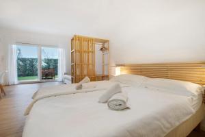Postel nebo postele na pokoji v ubytování Residence Blumar Jesolo Golf Club