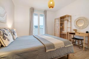 Postel nebo postele na pokoji v ubytování Residence Blumar Jesolo Golf Club