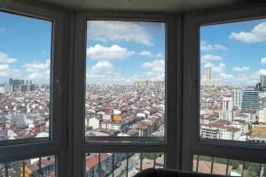 Nespecifikovaný výhled na destinaci Esenyurt nebo výhled na město při pohledu z apartmánu