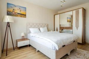 Postel nebo postele na pokoji v ubytování Deluxe King Suite MAI35