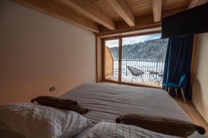 Postel nebo postele na pokoji v ubytování Bazzario B&B