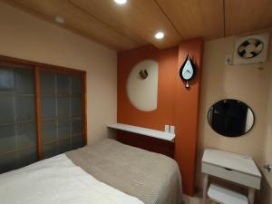 Katil atau katil-katil dalam bilik di 12全新装修 5室1厅2浴室2卫生间 设施齐全 最大12人 5 rooms 1dining room 2 bathrooms 2toilets Max 12P 免费无线网络