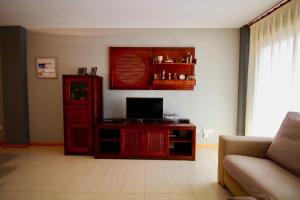 Μια τηλεόραση ή/και κέντρο ψυχαγωγίας στο Apartment Levante