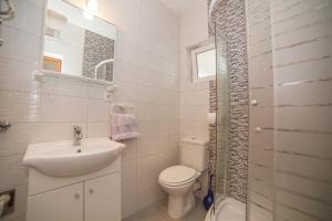 Kúpeľňa v ubytovaní Apartmani Vujić- Villa Dolac