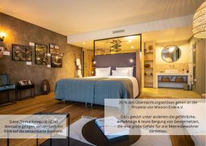 Postel nebo postele na pokoji v ubytování PAPA RHEIN - Hotel & Spa